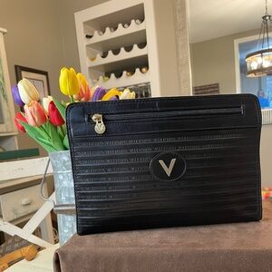 Mario Valentino Black and Gold Clutch with Elegant Wristlet